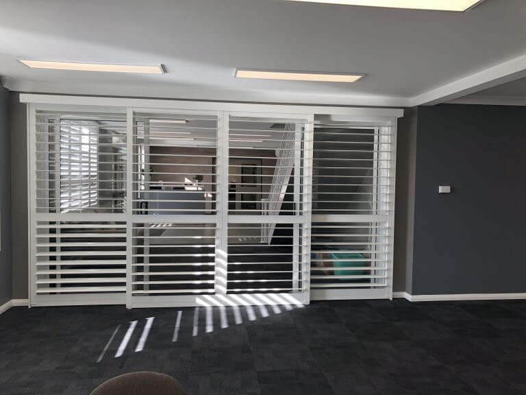 Tracked Bi-Pass plantation shutters